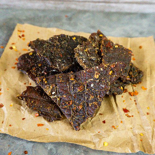 Red Pepper Beef Jerky | 3 oz. Bag | Perfect Balance Of Beef, Pepper, & Brown Sugar | Tender Meat | Burst Of Bold, Spicy Flavor | All Natural | Cooked To Perfection | Single Sourced, Hand Selected Cattle | Rich Source Of Natural Protein - Image 5